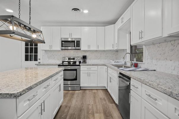 Interior, Kitchen, Pendant Lights, Recessed Lighting, Stainless Steel Appliances, Wood Texture Flooring