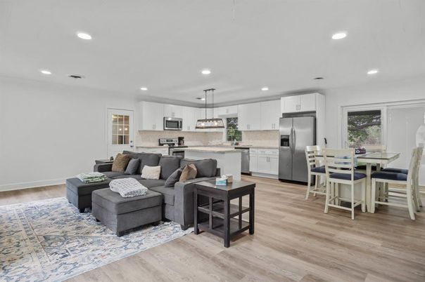 Dining room, Interior, Kitchen, Living room, Pendant Lights, Recessed Lighting, Stainless Steel Appliances, Wood Texture Flooring