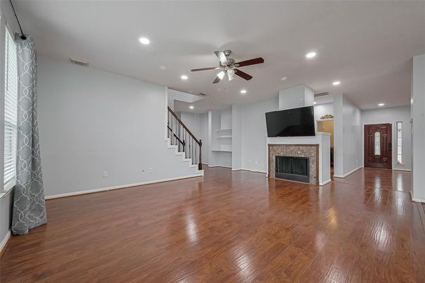 Empty room, Fireplace, Interior, Recessed Lighting, Wood Texture Flooring