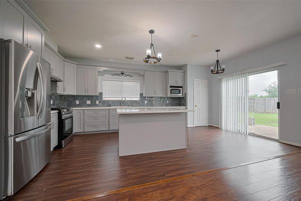 Chandelier, Interior, Kitchen, Pendant Lights, Recessed Lighting, Stainless Steel Appliances, Wood Texture Flooring