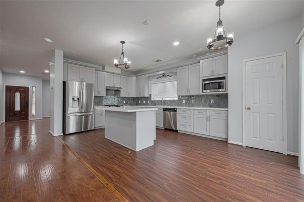 Interior, Kitchen, Pendant Lights, Recessed Lighting, Stainless Steel Appliances, Wood Texture Flooring