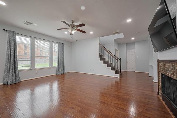 Empty room, Fireplace, Interior, Recessed Lighting, Wood Texture Flooring