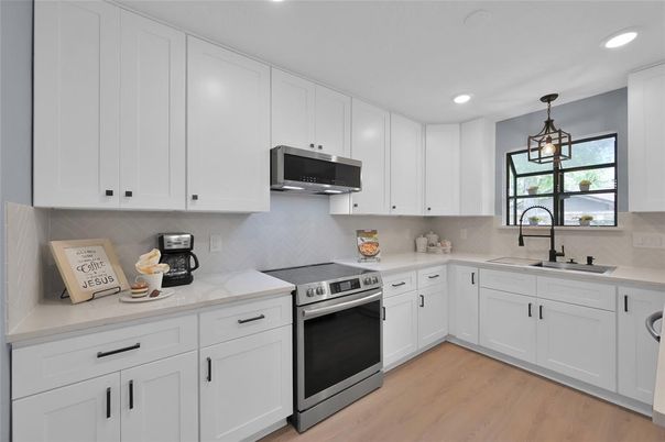 Interior, Kitchen, Pendant Lights, Recessed Lighting, Stainless Steel Appliances, Wood Texture Flooring
