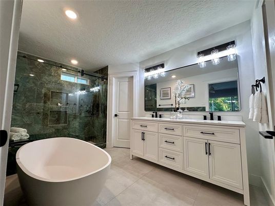 Bathroom, Dual Sink Vanities, Free Standing Baths, Glass Shower, Interior, Recessed Lighting