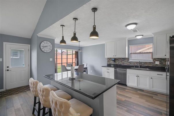 Dining room, Interior, Kitchen, Pendant Lights, Stainless Steel Appliances, Wood Texture Flooring
