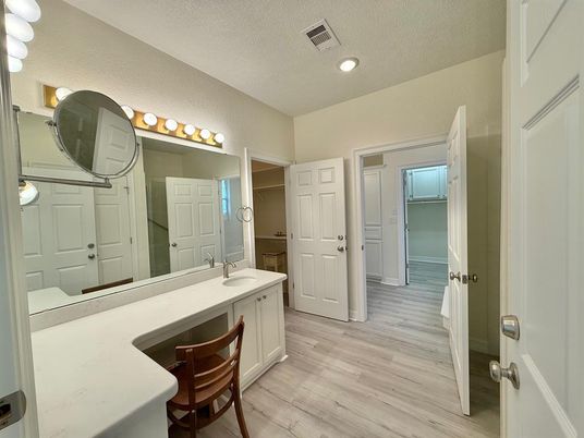 Bathroom, Dual Sink Vanities, Interior, Recessed Lighting, Wood Texture Flooring