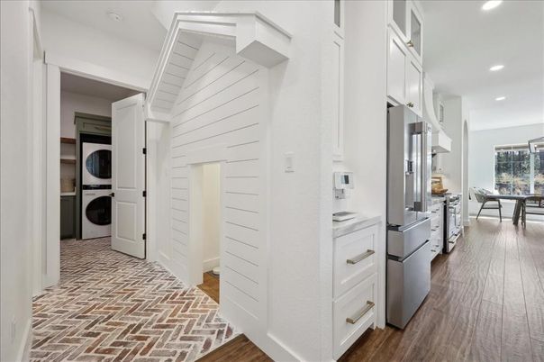 Interior, Kitchen, Recessed Lighting, Utility Closets, Washer, Wood Texture Flooring
