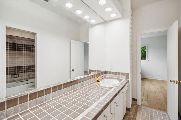 Bathroom, Interior, Recessed Lighting, Tile Countertops, Wood Texture Flooring