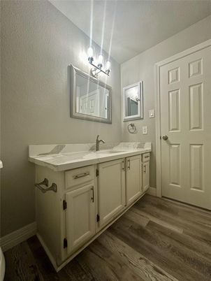 Bathroom, Dual Sink Vanities, Interior, Pendant Lights, Wood Texture Flooring