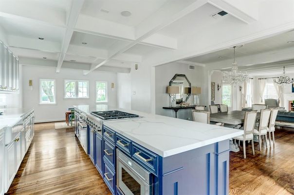 Chandelier, Dining room, Fireplace, Interior, Kitchen, Stainless Steel Appliances, Wood Texture Flooring