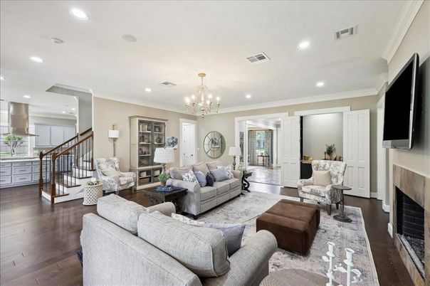 Chandelier, Fireplace, Interior, Living room, Recessed Lighting, Wood Texture Flooring