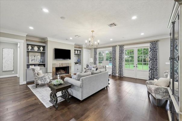 Chandelier, Fireplace, Interior, Living room, Recessed Lighting, Wood Texture Flooring