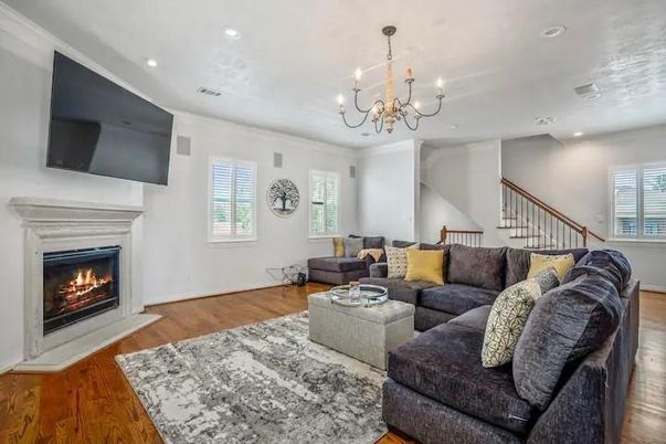 Chandelier, Fireplace, Interior, Living room, Recessed Lighting, Wood Texture Flooring