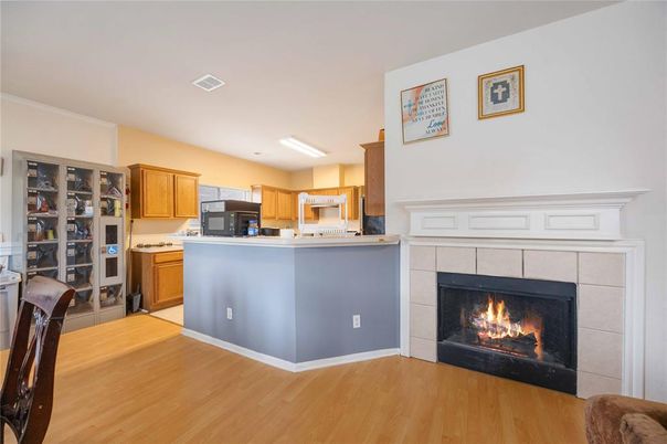 Fireplace, Interior, Kitchen, Recessed Lighting, Wood Texture Flooring
