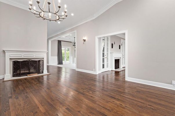 Chandelier, Empty room, Fireplace, Interior, Recessed Lighting, Wood Texture Flooring