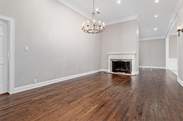 Chandelier, Empty room, Fireplace, Interior, Recessed Lighting, Wood Texture Flooring