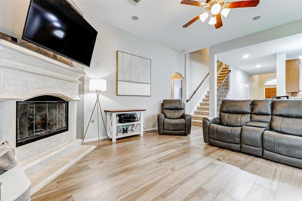 Fireplace, Interior, Living room, Recessed Lighting, Wood Texture Flooring