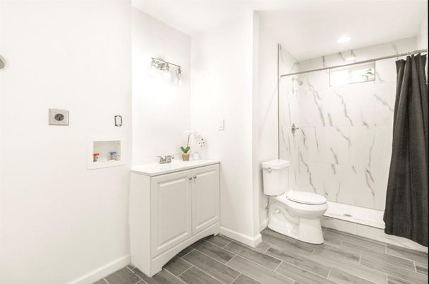 Bathroom, Interior, Marble Walls, Recessed Lighting, Wood Texture Flooring