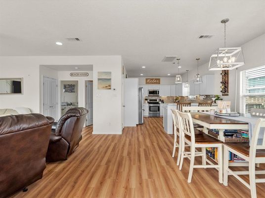 Dining room, Interior, Kitchen, Pendant Lights, Recessed Lighting, Stainless Steel Appliances, Wood Texture Flooring