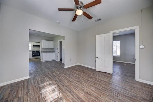 Empty room, Interior, Kitchen, Stainless Steel Appliances, Wood Texture Flooring