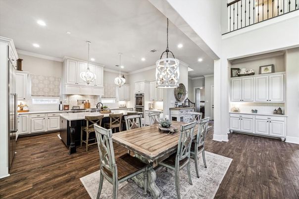 Dining room, Interior, Kitchen, Pendant Lights, Recessed Lighting, Stainless Steel Appliances, Wood Texture Flooring
