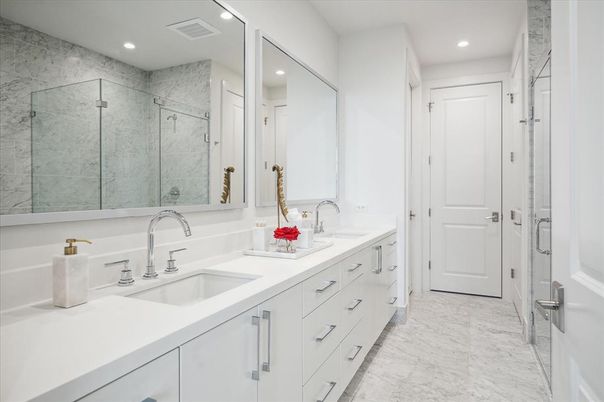 Bathroom, Dual Sink Vanities, Glass Shower, Interior, Marble, Marble Walls, Recessed Lighting