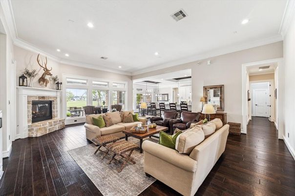 Dining room, Fireplace, Interior, Living room, Pendant Lights, Recessed Lighting, Wood Texture Flooring