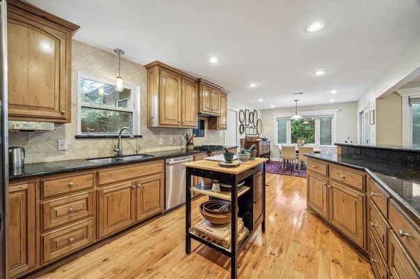 Dining room, Interior, Kitchen, Pendant Lights, Recessed Lighting, Stainless Steel Appliances, Wood Texture Flooring