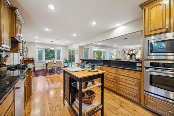 Dining room, Interior, Kitchen, Pendant Lights, Recessed Lighting, Stainless Steel Appliances, Wood Texture Flooring