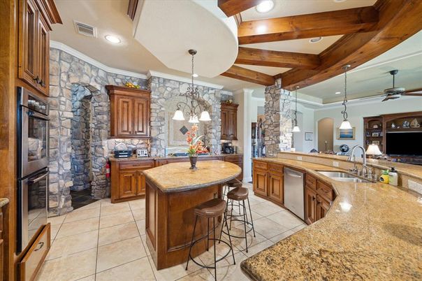Interior, Kitchen, Pendant Lights, Recessed Lighting, Stainless Steel Appliances, Stone Walls, Wooden Beams