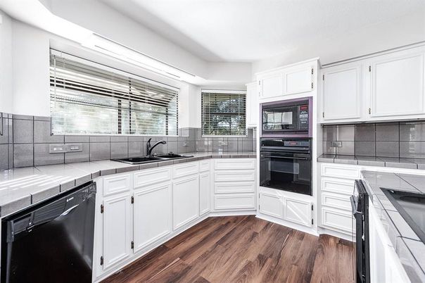 Interior, Kitchen, Tile Countertops, Wood Texture Flooring