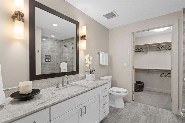 Bathroom, Dual Sink Vanities, Glass Shower, Interior, Recessed Lighting, Walk-in Closets, Wood Texture Flooring