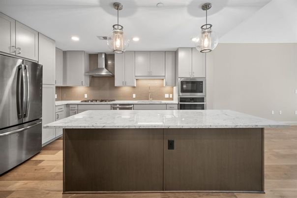 Interior, Kitchen, Pendant Lights, Recessed Lighting, Stainless Steel Appliances, Wood Texture Flooring