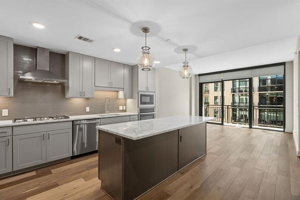 Interior, Kitchen, Pendant Lights, Recessed Lighting, Stainless Steel Appliances, Wood Texture Flooring