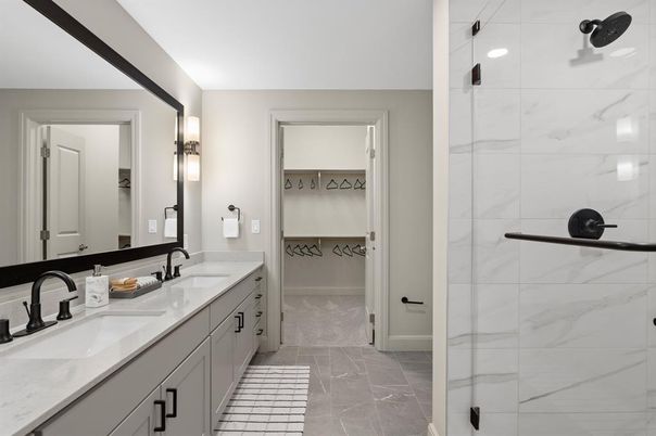 Bathroom, Dual Sink Vanities, Glass Shower, Interior, Marble, Marble Walls, Walk-in Closets