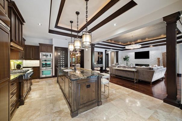 Chandelier, Interior, Kitchen, Living room, Pendant Lights, Recessed Lighting, Stainless Steel Appliances, Wood Texture Flooring