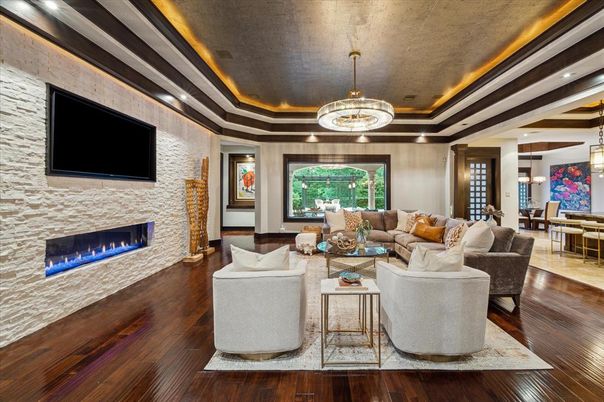 Dining room, Fireplace, Interior, Living room, Pendant Lights, Recessed Lighting, Stone Walls, Wood Texture Flooring