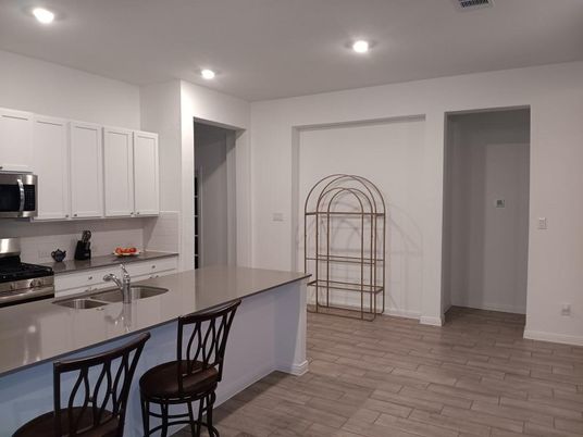Interior, Kitchen, Recessed Lighting, Stainless Steel Appliances, Wood Texture Flooring