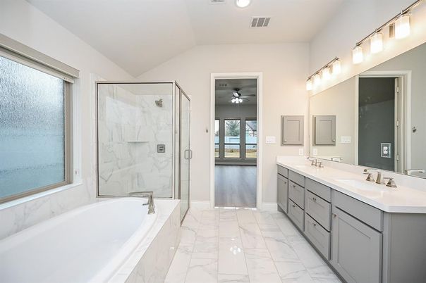 Bathroom, Dual Sink Vanities, Glass Shower, Interior, Marble, Marble Walls, Recessed Lighting