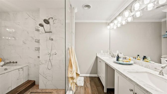 Bathroom, Dual Sink Vanities, Glass Shower, Interior, Marble Walls, Wood Texture Flooring
