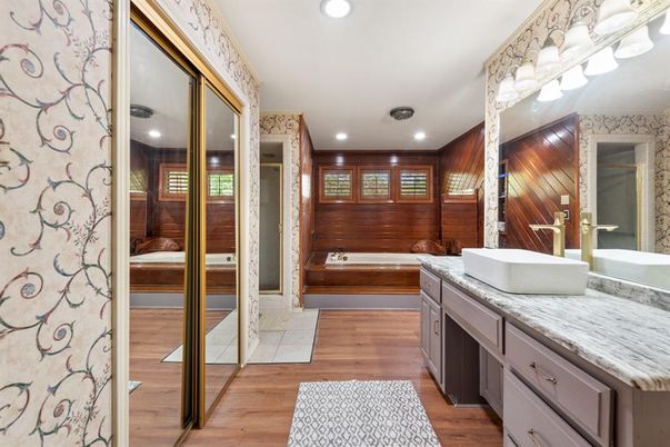 Bathroom, Dual Sink Vanities, Interior, Recessed Lighting, Wood Texture Flooring, Wooden Walls