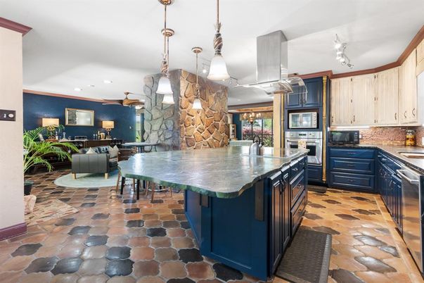 Dining room, Interior, Kitchen, Living room, Pendant Lights, Recessed Lighting, Stainless Steel Appliances, Stone Walls
