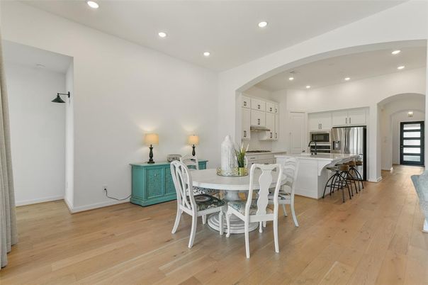 Dining room, Interior, Kitchen, Recessed Lighting, Stainless Steel Appliances, Wood Texture Flooring