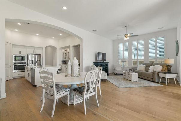 Dining room, Interior, Kitchen, Living room, Recessed Lighting, Stainless Steel Appliances, Wood Texture Flooring