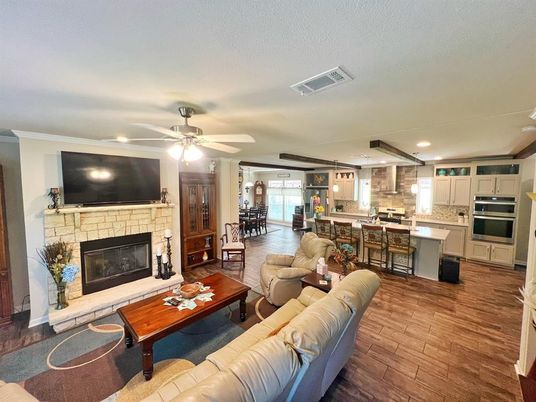 Dining room, Fireplace, Interior, Kitchen, Living room, Pendant Lights, Recessed Lighting, Stone Walls, Wood Texture Flooring