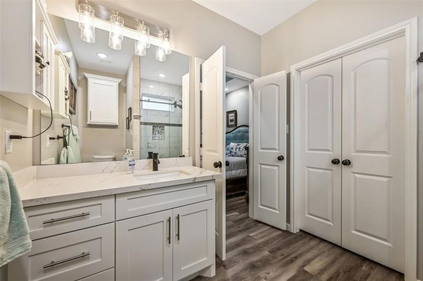 Bathroom, Dual Sink Vanities, Glass Shower, Interior, Wood Texture Flooring