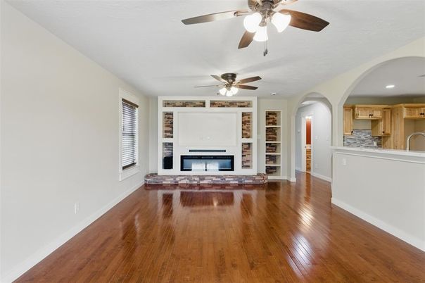 Empty room, Fireplace, Interior, Recessed Lighting, Wood Texture Flooring