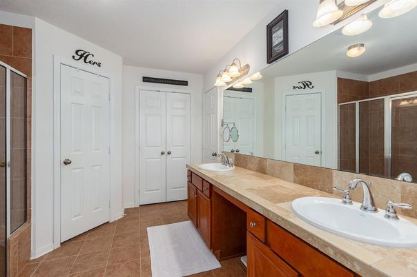 Bathroom, Dual Sink Vanities, Glass Shower, Interior, Tile Countertops