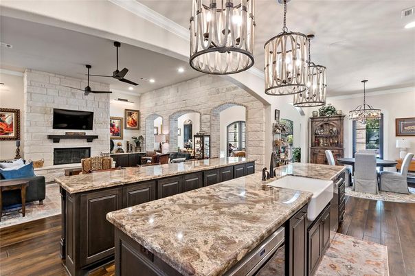 Dining room, Fireplace, Interior, Living room, Pendant Lights, Recessed Lighting, Stone Walls, Wood Texture Flooring