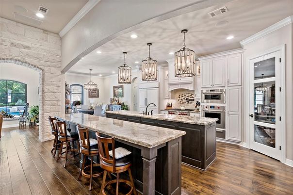 Interior, Kitchen, Pendant Lights, Recessed Lighting, Stainless Steel Appliances, Stone Walls, Wood Texture Flooring